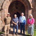 Our panel of guests for our Herefordshire Histories Festival event, stood outside St Tysilio's Church